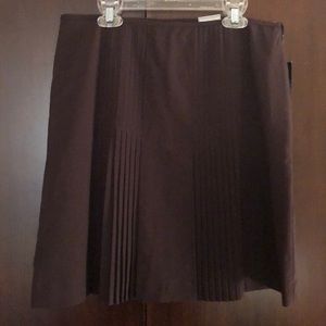 Short brown side zipper skirt.